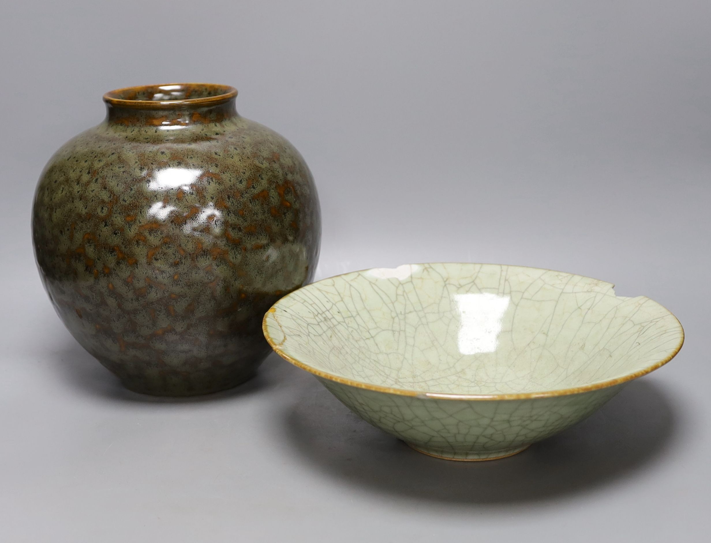 A Chinese Jian type ginger jar and a crackle glazed celadon bowl, 28cm diameter